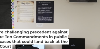 Students work under posters of the Ten Commandments and the Bill of Rights in a high school classroom in Kyle, Texas, on Oct. 16, 2025. AP Photo/Eric Gay